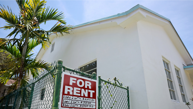 A "for rent" sign in front of a home on July 12, 2023 in Miami.