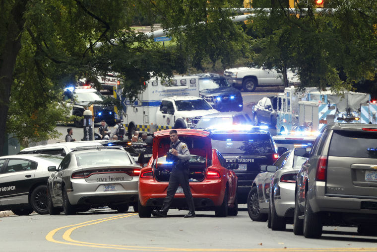 Law enforcement and first responders work at the scene of a shooting on the University of North Carolina at Chapel Hill campus