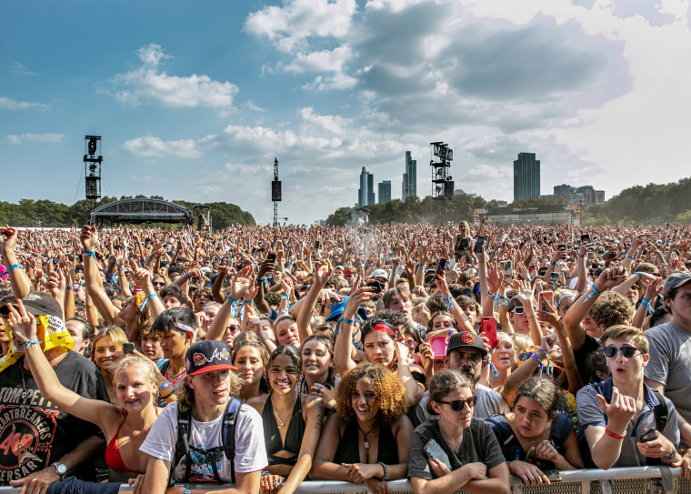 Festival-goers attend day 3 of Lollapalooza at Grant Park on July 30, 2021 in Chicago, Illinois. 