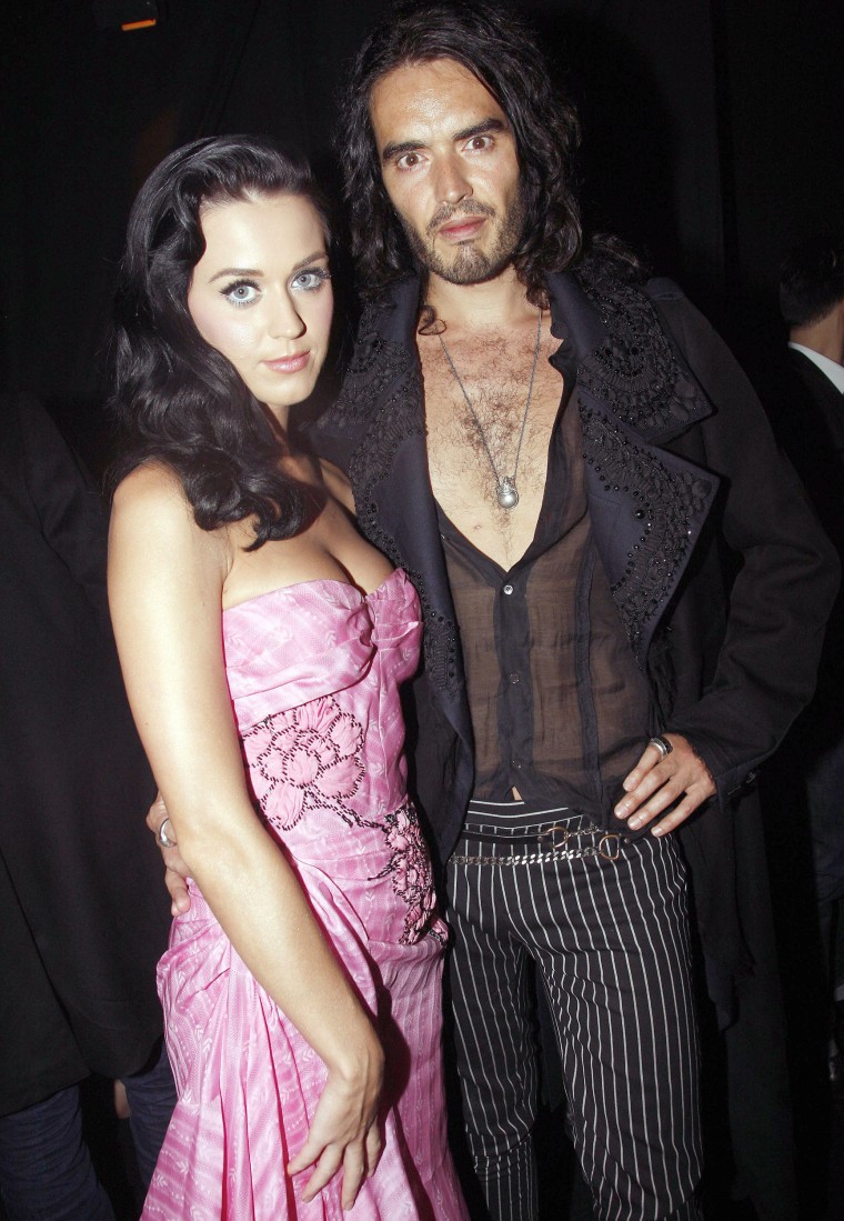 Katy Perry and Russell Brand attend John Galliano Pret a Porter show as part of the Paris Womenswear Fashion Week Spring/Summer 2010 at Halle Freyssinet on October 7, 2009 in Paris, France. 