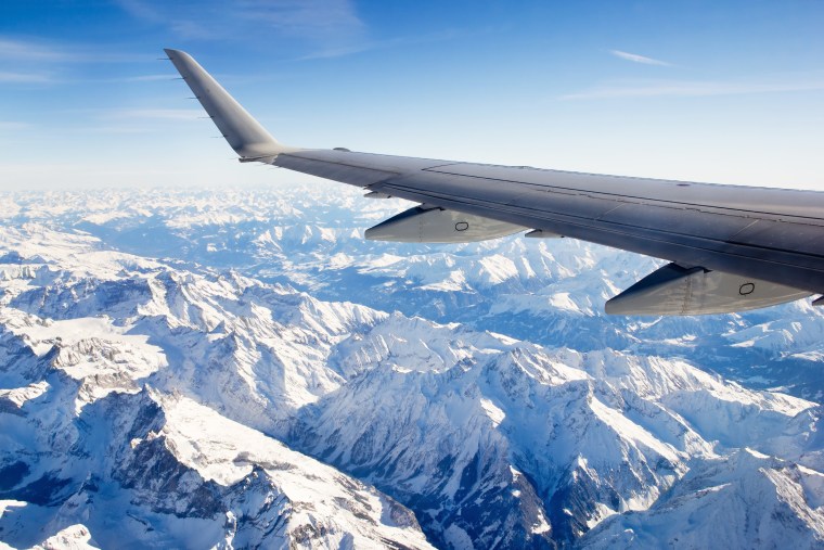 Flight over the snow Alps