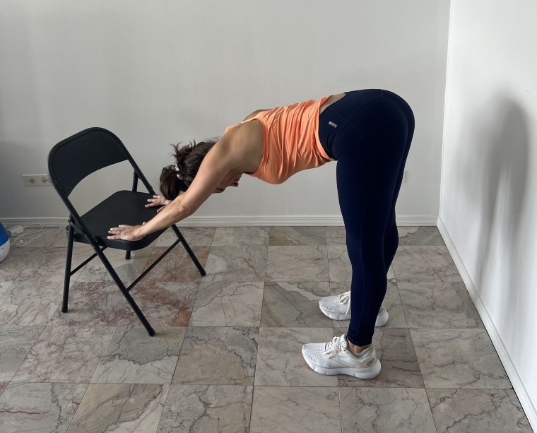 Downward facing dog chair yoga
