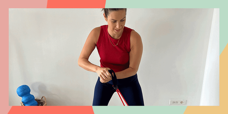 Stephanie Mansour does resistance band arm workouts