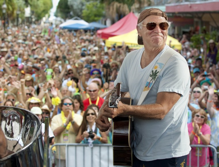 Image: Singer/songwriter Jimmy Buffett performs on Duval Street in Key West, Fla., in 2011.