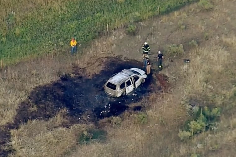 Police say a shooting led to a car crash and fire near Livermore, Colo., on Aug. 31, 2023.