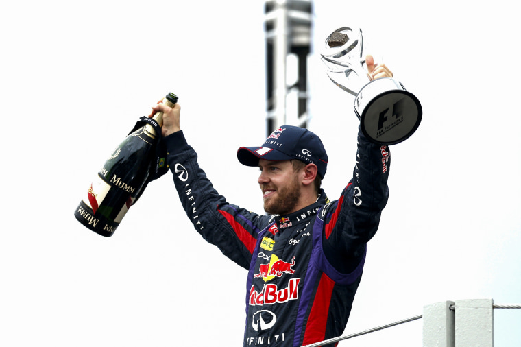 Sebastian Vettel celebrates his ninth consecutive win at the F1 Grand Prix in Brazil on Nov. 24, 2013.