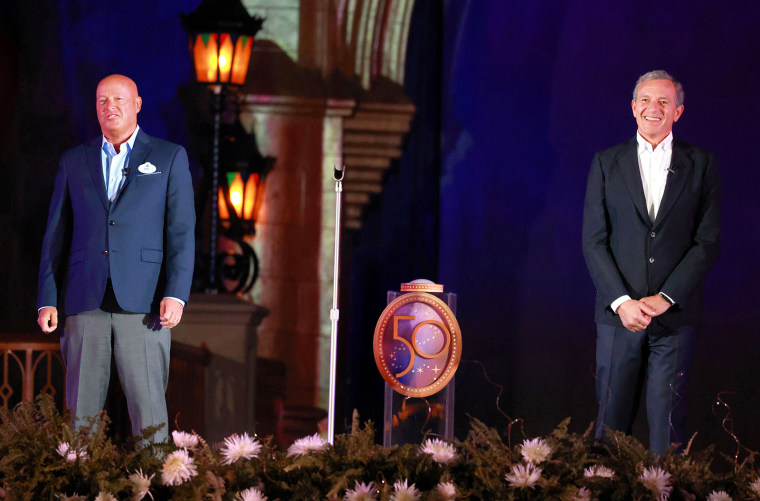 Bob Chapek, left, and Bob Iger during the rededication ceremony marking the 50th anniversary of Walt Disney World, in Lake Buena Vista, Fla