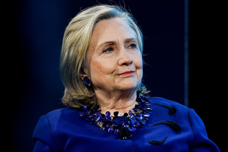 Hillary Clinton moderates a panel in Washington in 2022.