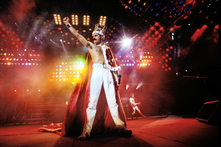 Freddie Mercury of Queen performs at Wembley Stadium in London, 1986.