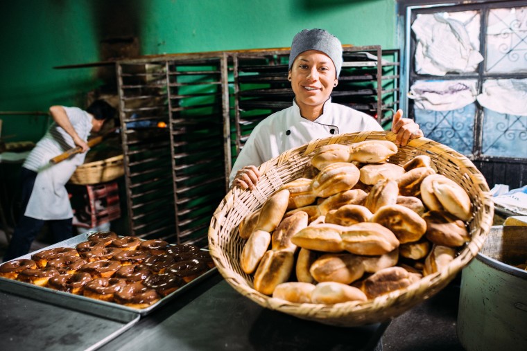 How important was the traditional bread baker role in the community?