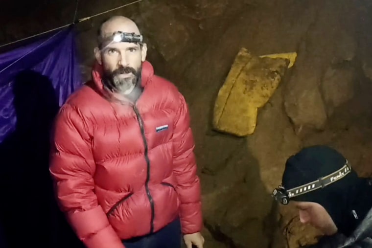 American caver Mark Dickey next to a colleague inside the Morca cave near Anamur, southern Turkey, on Sept. 7, 2023.