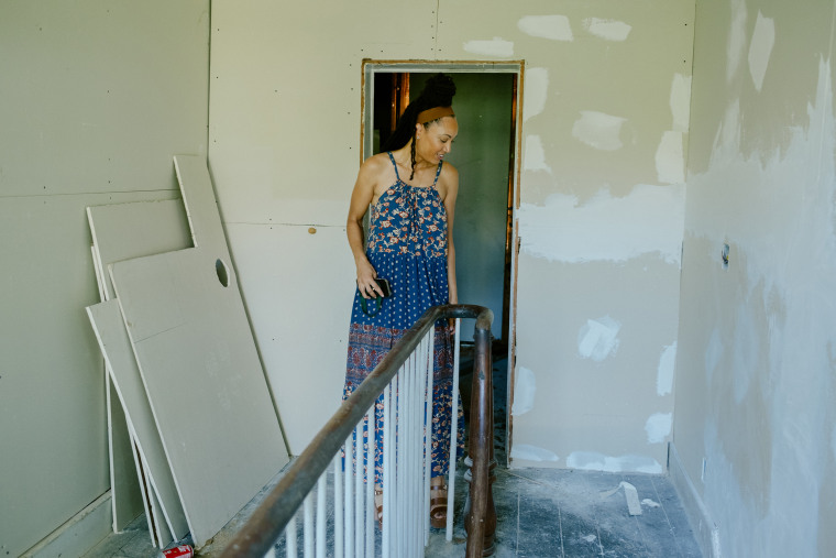 Stephanie Mitchell walks through the construction of the Birthing Sanctuary in Sumter County, Ala.