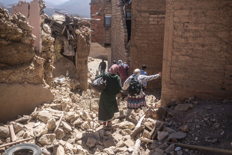 Residents flee their homes after an earthquake in Moulay Brahim village, near the epicenter of the earthquake, outside Marrakech, Morocco, Sept. 9, 2023. 