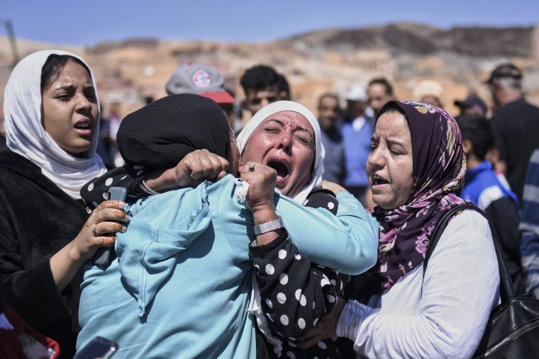 Women cry as they mourn victims of the earthquake in Moulay Brahim in the province of Al Haouz, Morocco, on Sept. 10, 2023.