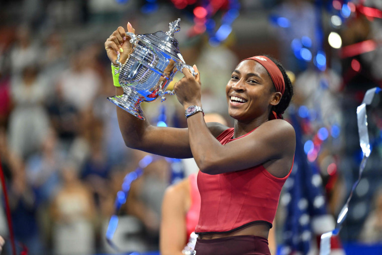 Coco Gauff with the trophy after defeating Aryna Sabalenka in the US Open women's singles final match, in New York,