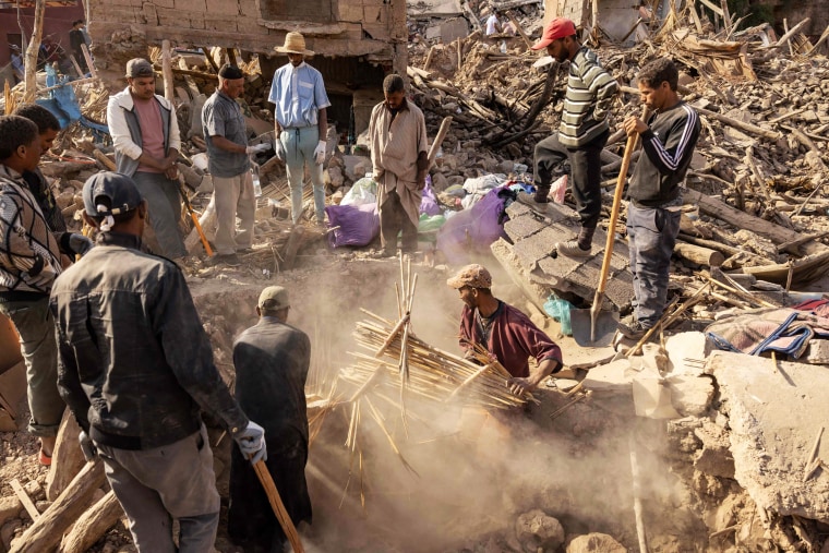 Using heavy equipment and even their bare hands, rescuers in Morocco on September 10 stepped up efforts to find survivors of a devastating earthquake that killed more than 2,100 people and flattened villages.