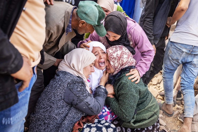 Using heavy equipment and even their bare hands, rescuers in Morocco on September 10 stepped up efforts to find survivors of a devastating earthquake that killed more than 2,100 people and flattened villages.