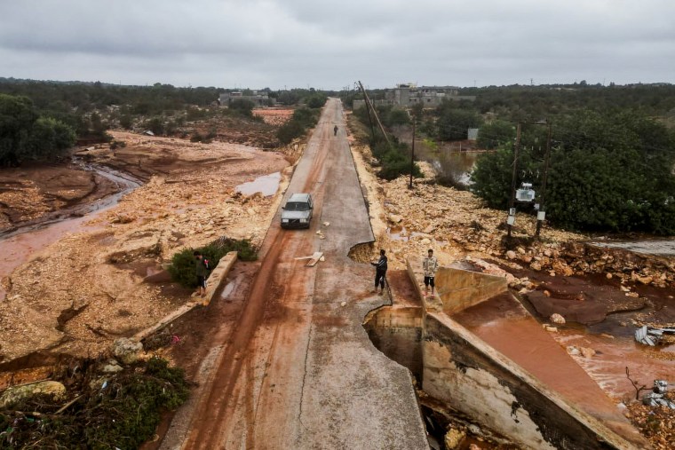 A damaged road after a powerful storm and heavy rainfall hit Shahhat, Libya, on Sept. 11, 2023.