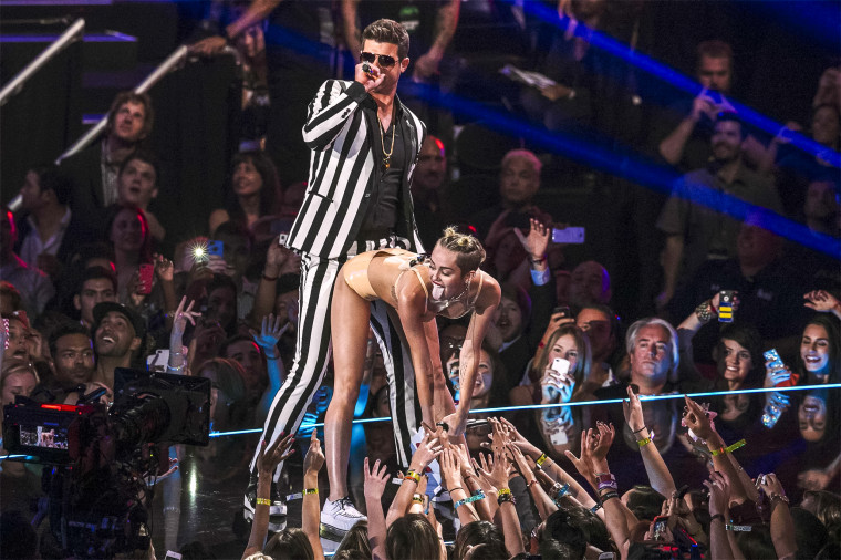 Miley Cyrus and Robin Thicke perform "Blurred Lines" during the 2013 MTV Video Music Awards in New York on Aug. 25, 2013.