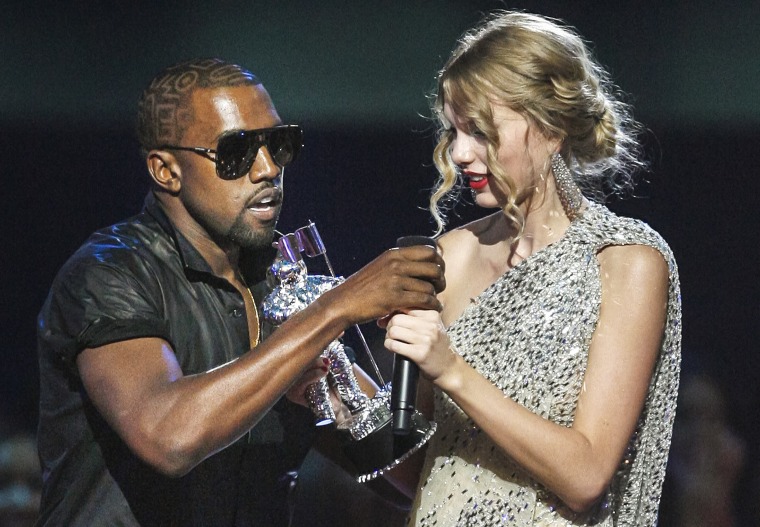 Image: Kanye West takes the microphone from singer Taylor Swift as she accepts the "Best Female Video" award during the MTV Video Music Awards in New York on Sept. 13, 2009.