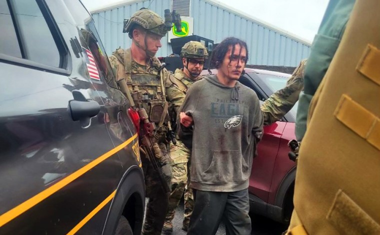 A vehicle leaves the Chester County Correctional Complex as the search  continues for Danelo Cavalcante in Pocopson Township, Pa., on Sunday, Sept.  3, 2023. Cavalcante escaped from the Chester County Prison. Cavalcante