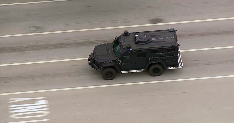 The police vehicle carrying escaped murderer Danelo Cavalcante after officers apprehended him Wednesday morning.