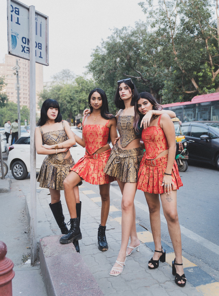 Svarini's corset and pleated skirt combination.