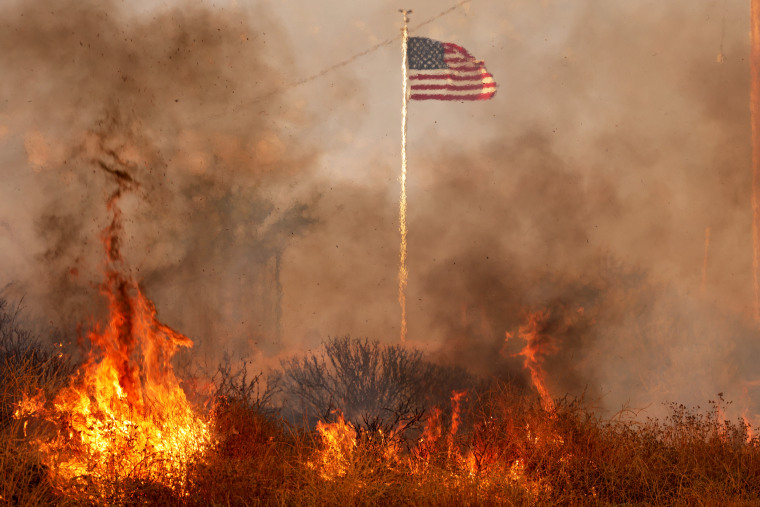 Image: A wildfire burns in Riverside County, Calif., on July 14, as a heat dome bakes the southwest.