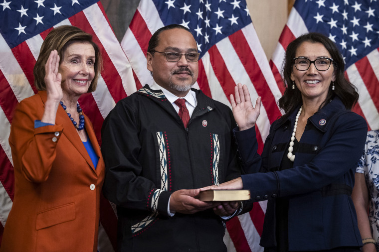 Rep. Mary Peltola, D-Alaska, at right, is sworn in alongside her husband, Gene Peltola, and House Speaker Nancy Pelosi, D-Calif., at the Capitol on Sept. 13, 2022.