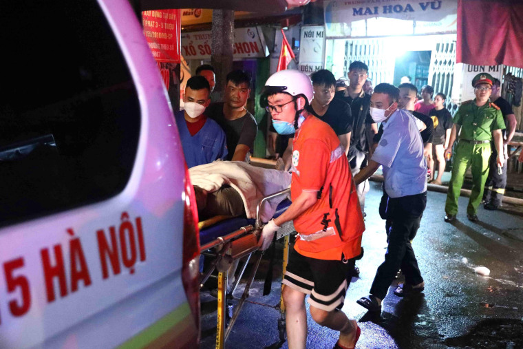 Fire in a 9-story apartment building in Vietnam’s capital kills at least 10 people 