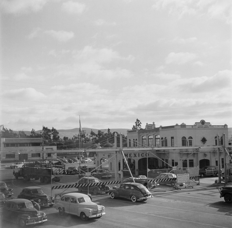 Cars parked at the Tijuana and San Diego border crossing in Calexico, Calif., in 1950.