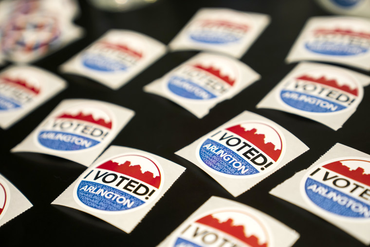 Voting stickers are seen here at polling location inside the Museum of Contemporary Art on November 8, 2022 in Arlington,Virginia. After months of candidates campaigning, Americans are voting in the midterm elections to decide close races across the nation.