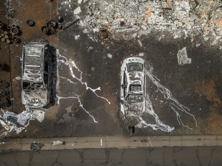 Cars melted from the fires in Lahaina.