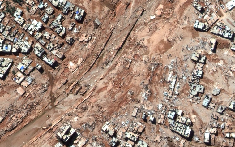 Maxar satellite imagery of streets, neighborhoods and bridges after the catastrophic flooding that struck the Libyan coastal city of Derna. 