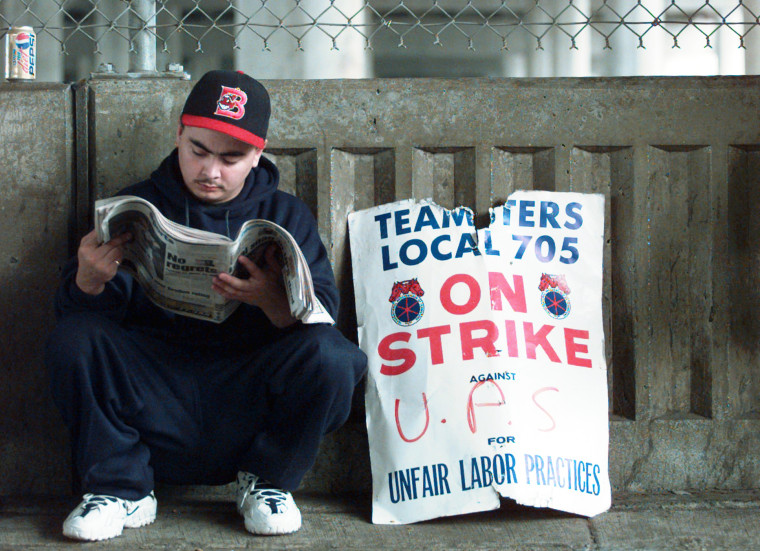 Steve Romero on strike outside a UPS facility in Chicago in 1997.