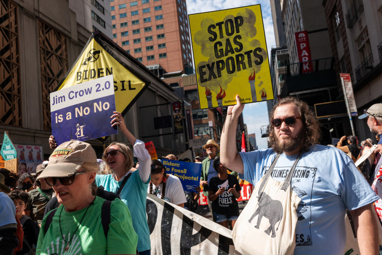 Activists protest during the "March to End Fossil Fuels"