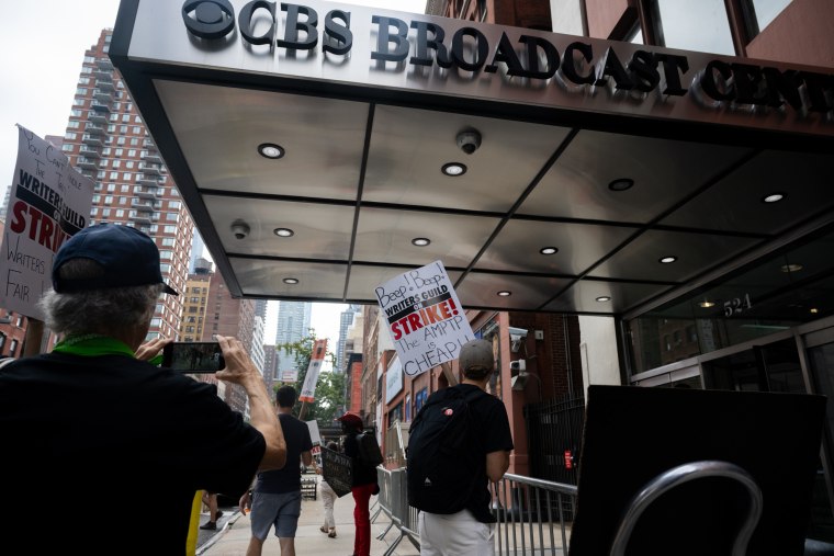 Members of the WGA and SAG-AFTRA picket outside of The Drew Barrymore Show