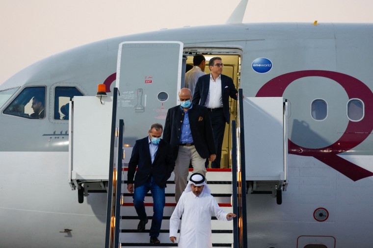 U.S. citizens, from left, Emad Sharqi and Morad Tahbaz Siamak Namazi disembark from a Qatari jet upon their arrival at the Doha International Airport on Sept. 18, 2023.