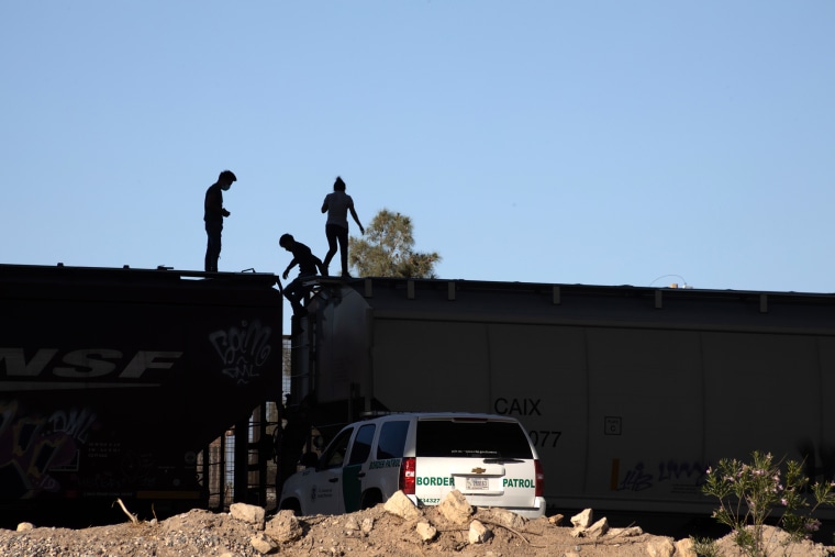 Three young migrants traveling on a freight train crossing the border were discovered by the border patrol and asked to get off the train in Ciudad Juarez, Chihuahua, Mexico on May 11, 2021.