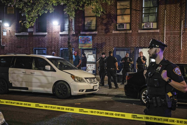 Police investigators at a day care in the Bronx, after a 1-year-old boy died and three other young children were hospitalized on Friday Sept. 15, 2023. (Dave Sanders/The New York Times)