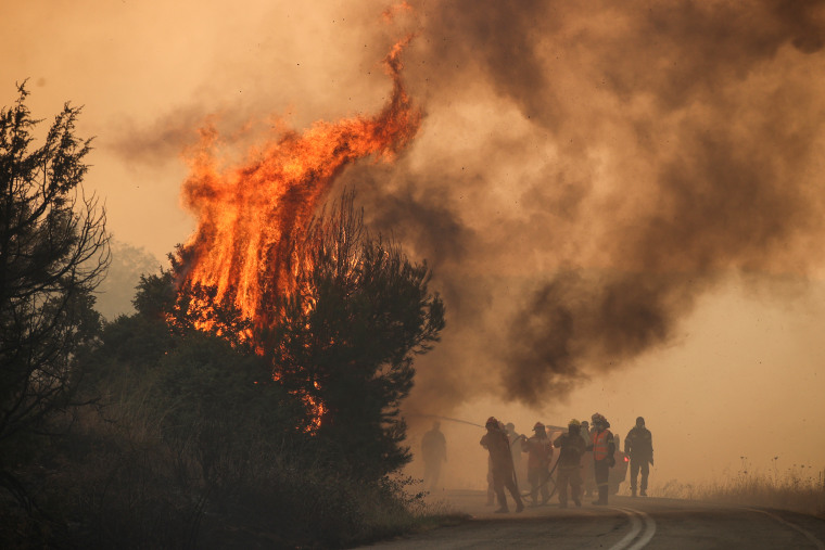 Firefighters respond to a wildfire in Evros, Greece, on Aug. 31, 2023.