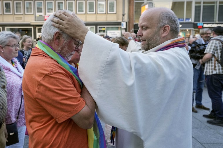 Married and same-sex couples take part in a public blessing ceremony in front of the Cologne Cathedral in Germany on Sept. 20, 2023.