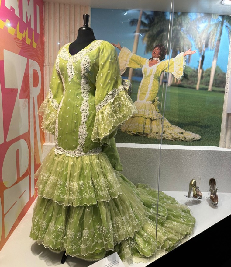 The dress and photograph from the series "I am from Cuba the Voice, Guantanamera!" exhibited at the Tower Theater in Miami.