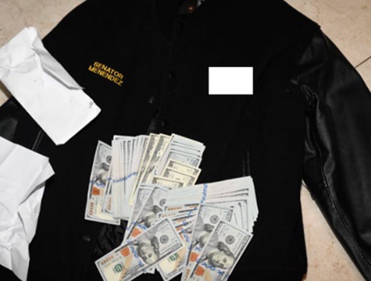 Federal investigators allege cash found money stuffed in Menendez jackets when they executed a search warrant in June 2022.