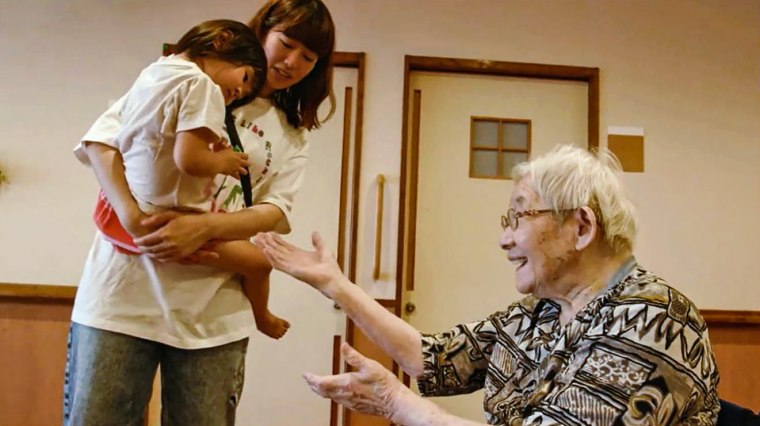 Toddlers visit residents at the Ichoan Nursing Home.