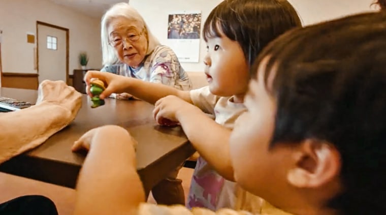 Toddlers visit residents at the Ichoan Nursing Home.