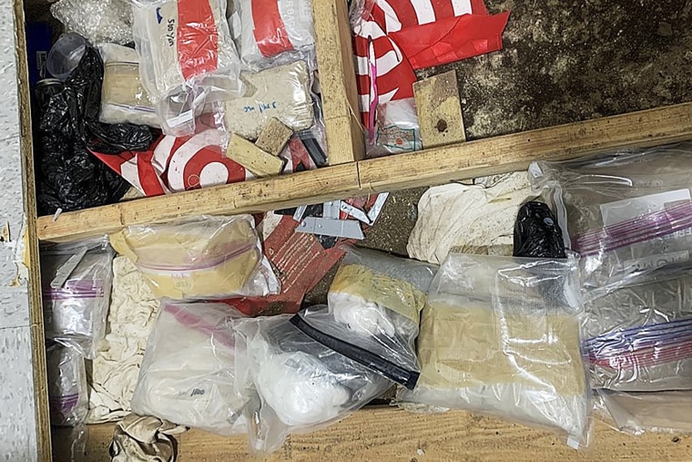 In this photo provided by the New York City Police Department, narcotics, including fentanyl, and drug paraphernalia lie stored in the floor of a day care center on  Sept. 21, 2023, in New York. 