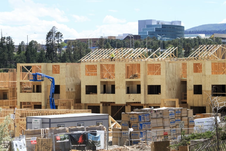 Construction work on a new apartment complex in Los Alamos, N.M., on June 22, 2023.