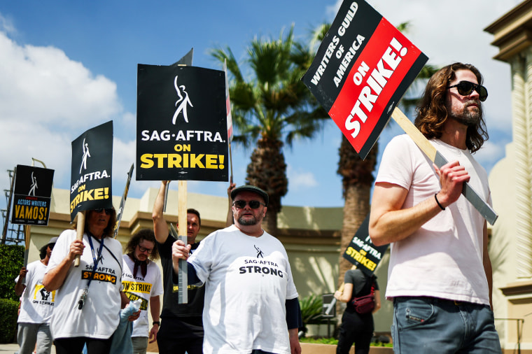 Striking WGA and SAG-AFTRA members outside Paramount Studios in Los Angeles on Sept. 18, 2023.