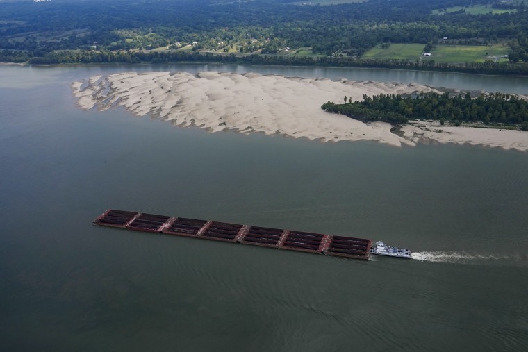 A tugboat navigates around a sandbar during low water levels on the Mississippi River between Baton Rouge and Reserve, La., on Sept. 14, 2023.